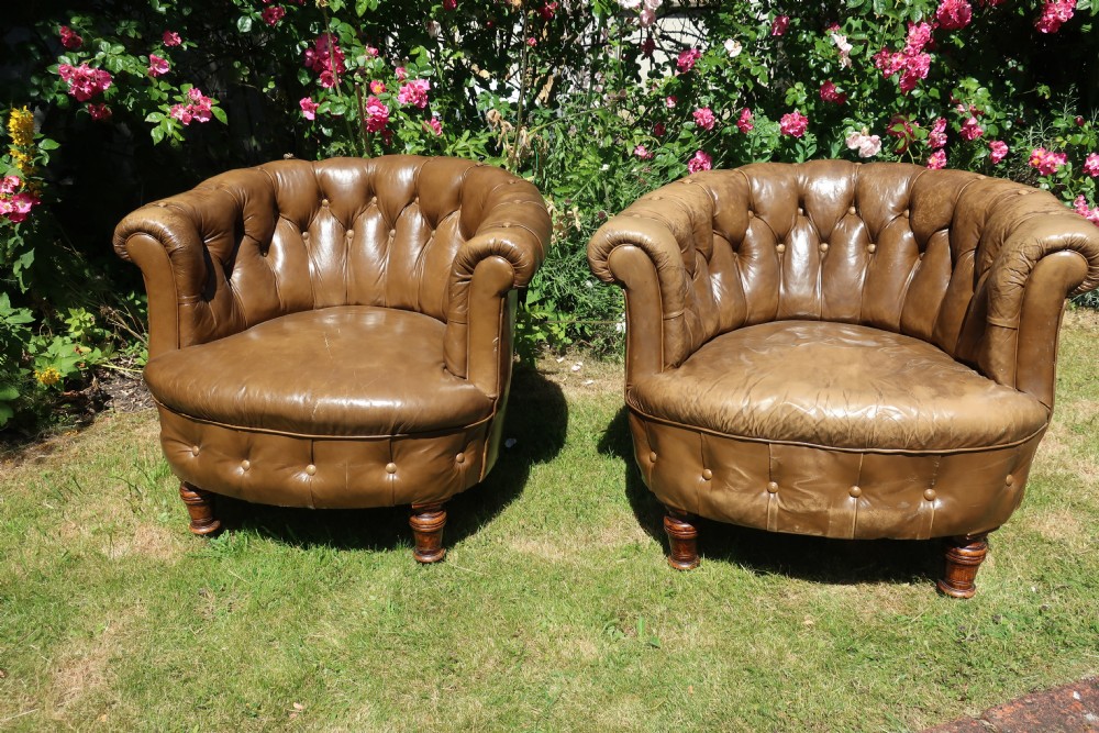 Pair of button-back leather tub chairs View III