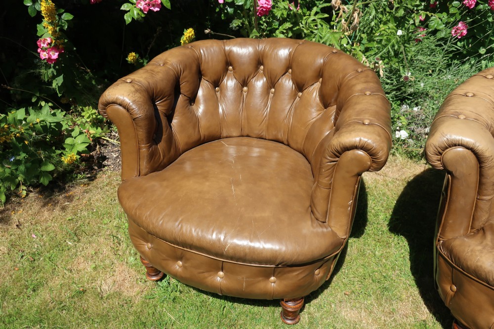 Pair of button-back leather tub chairs View IV