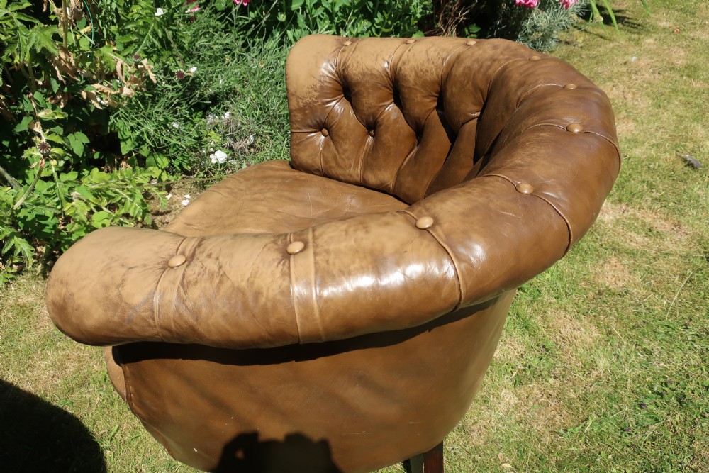 Pair of button-back leather tub chairs View VII