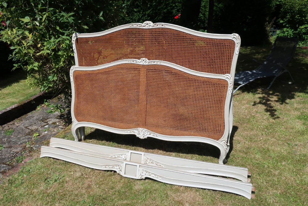 Kingsize painted cane bed View II