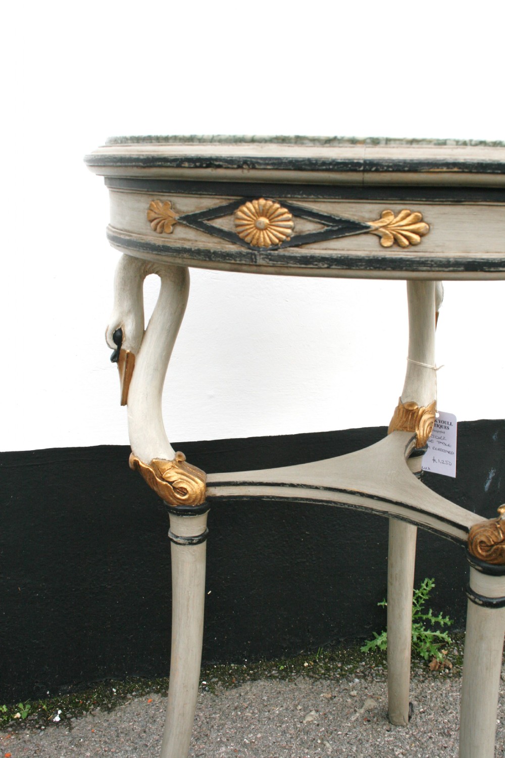 very pretty occasional table surmounted with swans  View IV