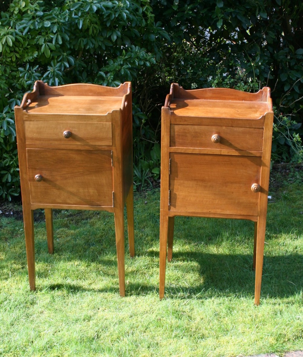pair of french walnut bedside tables 