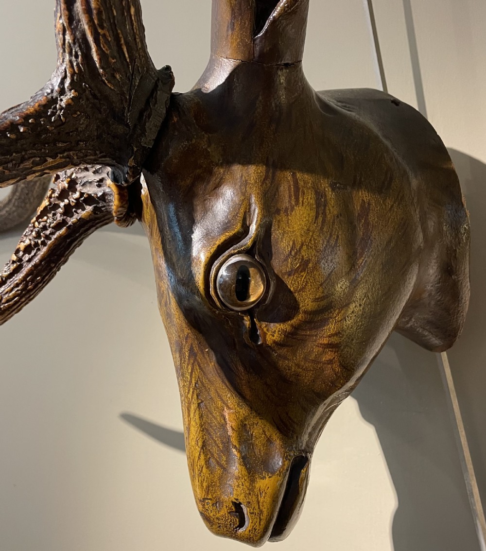 Carved deer head  View IV