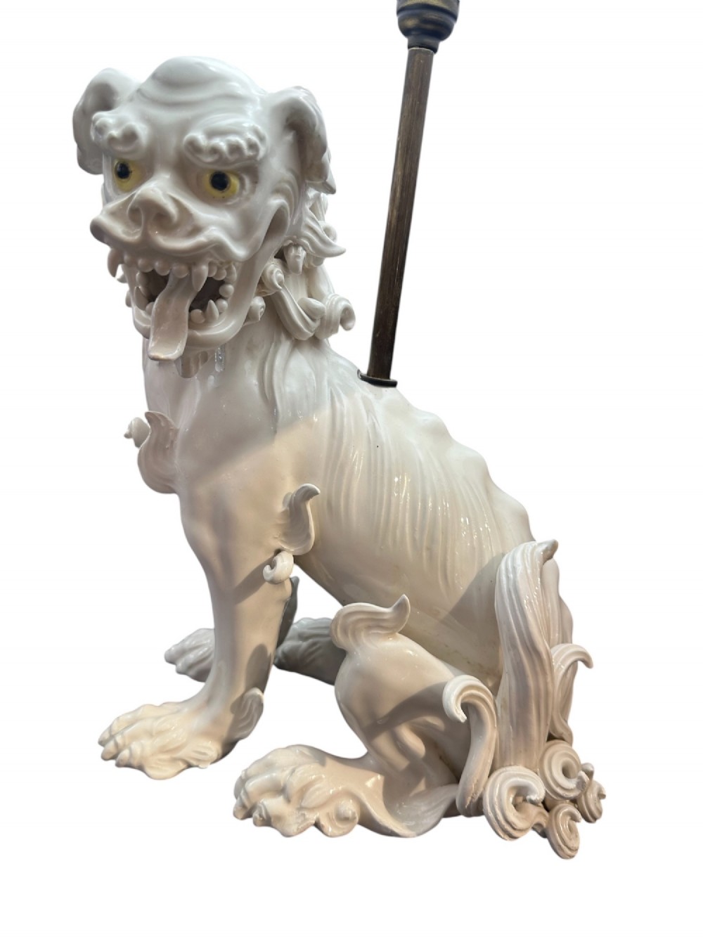 A pair of early 20th-century off-white porcelain Foo Dog table lamps with tall cream fabric shades. View III