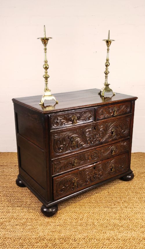 fig 1. A 17th century carved chest of drawers