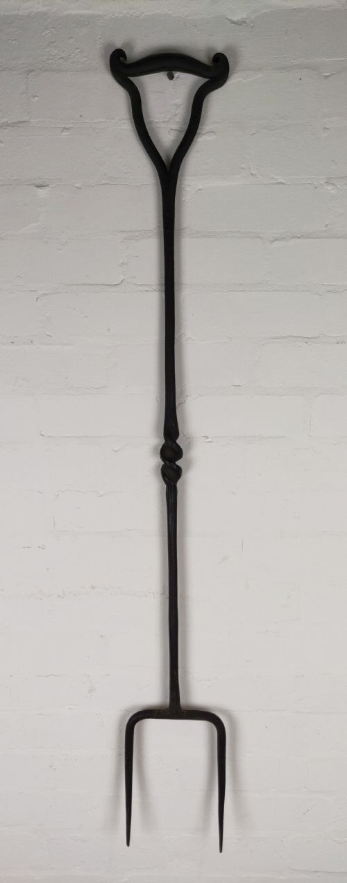 A Large 19th Century Wrought Iron Log Fork.