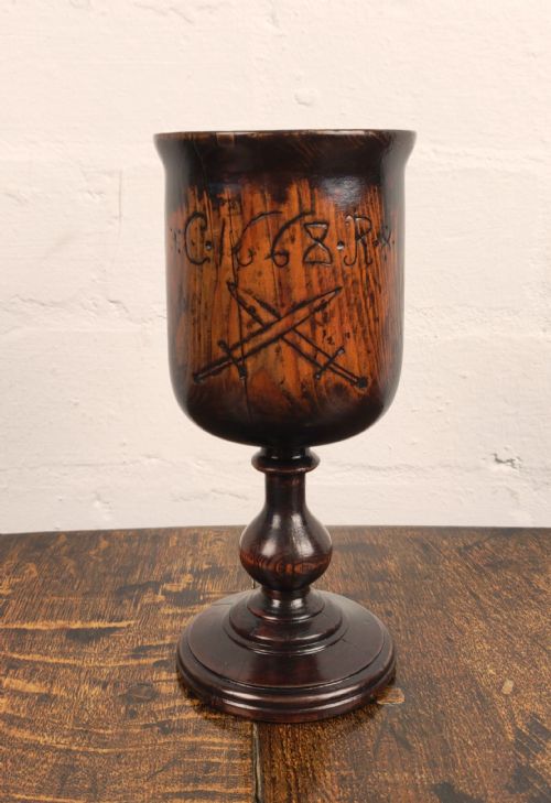 A 17th Century English Yew Wine Cup.