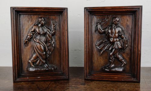 A Pair of 17th Century Carved Panels Depicting Odysseus.