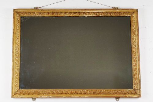 A Late 18th - Early 19th Century Carved Mirror.