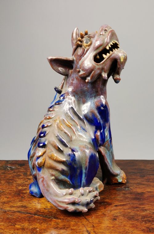 A 19th Century Shiwan Ware Lion.