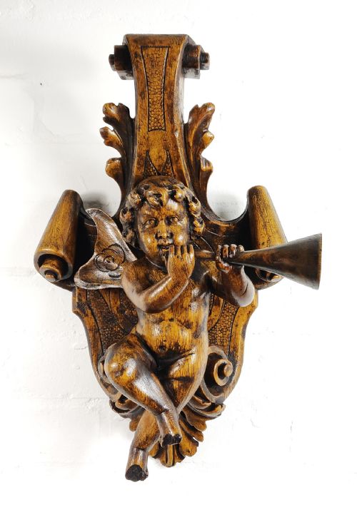 A 19th Century Carved Cherub.