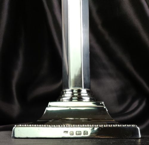 fig 1. A fine pair of silver candlesticks.