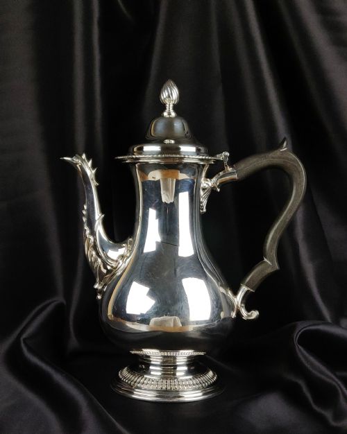 A High Quality George III Style Silver Coffee Pot.