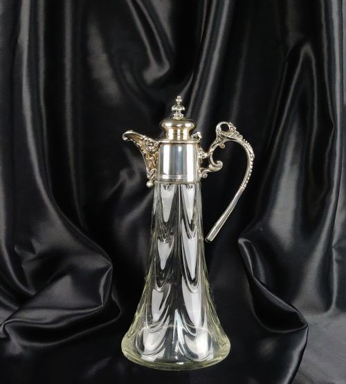 A Silver Plated Claret Jug Circa 1900.