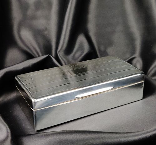 A Late 1920'S Silver Cigar Case.