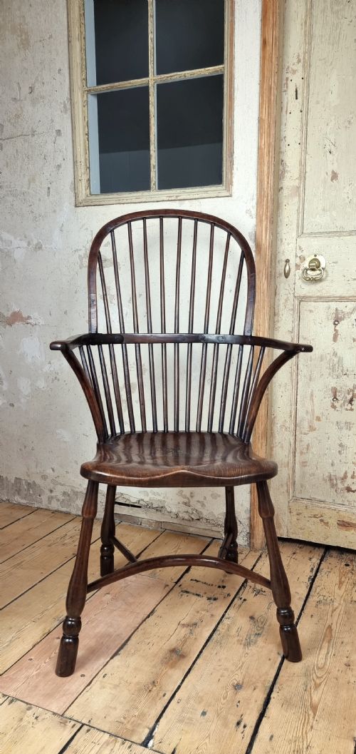A Late 18th Century Walnut Windsor Chair.