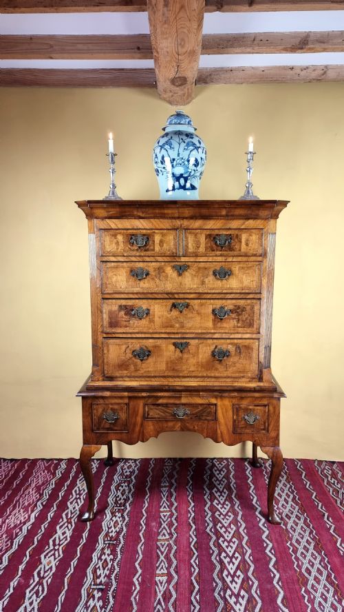 fig 1. An early 18th century walnut chest on stand.