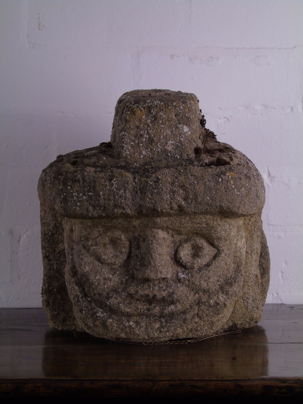 Ancient carved limestone head possibly Celtic. 