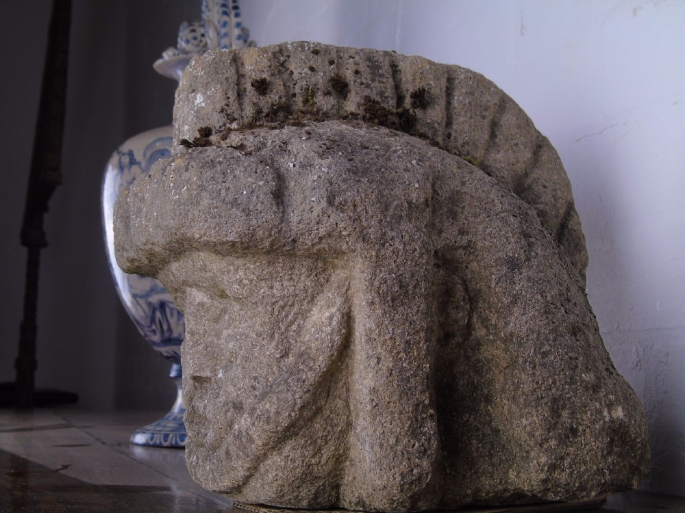 Ancient carved limestone head possibly Celtic.  View III