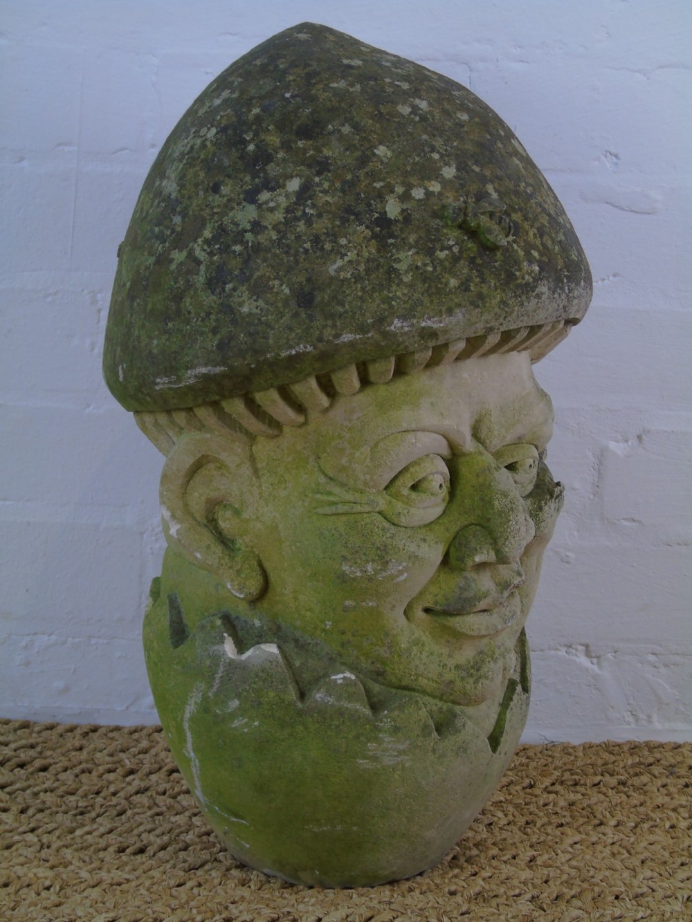 A Late 19th early 20th Century carved limestone head View II