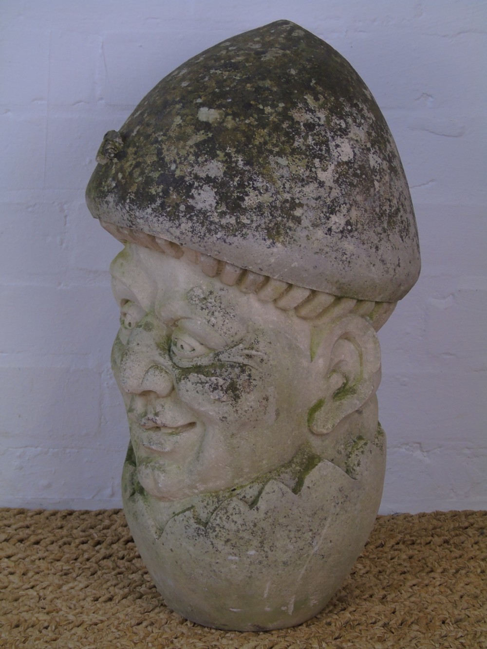 A Late 19th early 20th Century carved limestone head View III