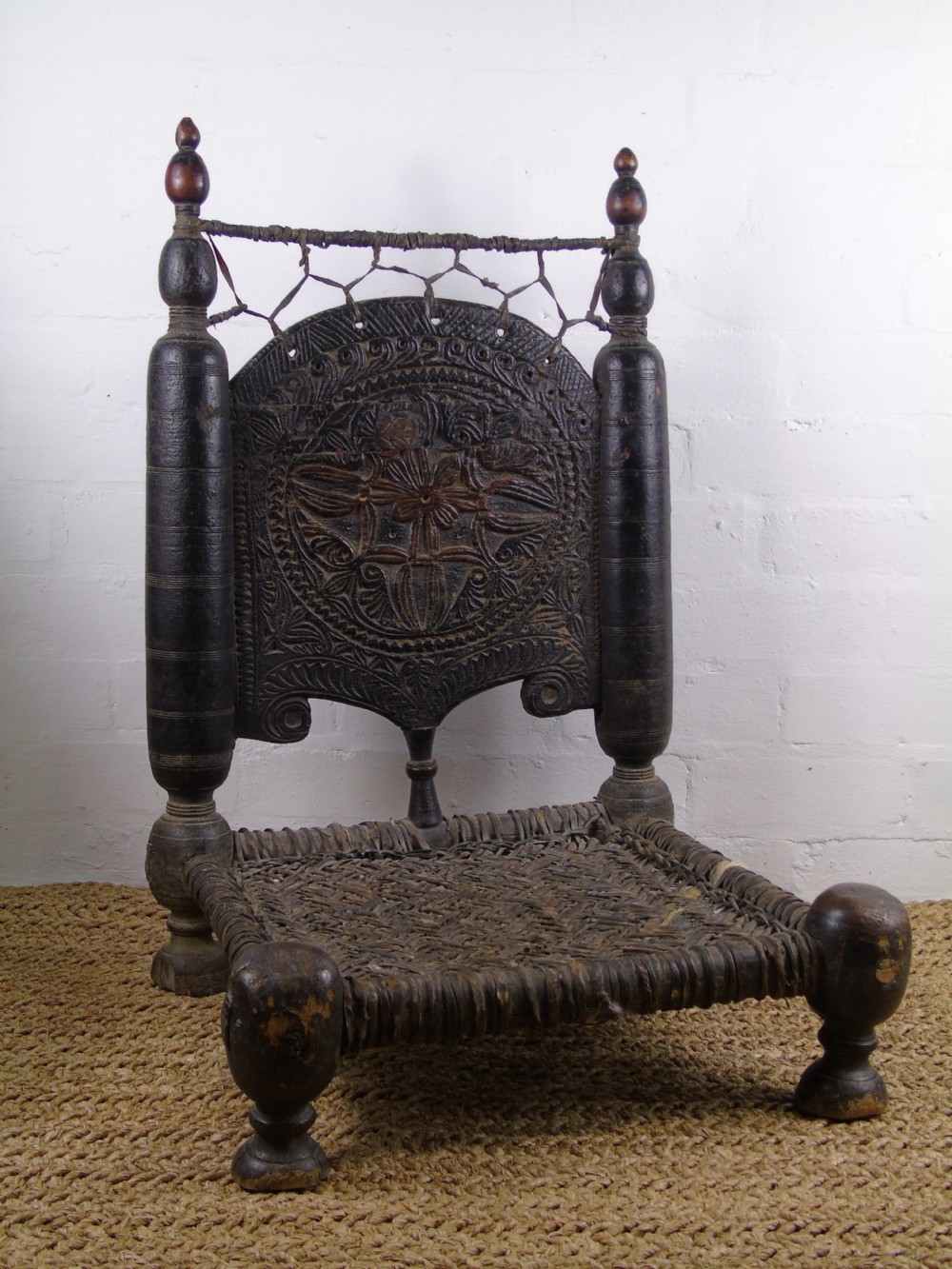 A fantastic 17th Century Indian low chair