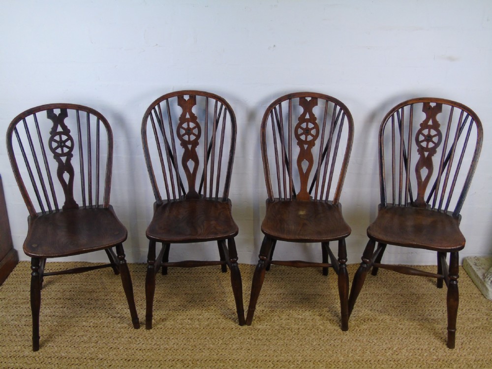 19th Century Harlequin set of 6 wheel back chairs.  View II