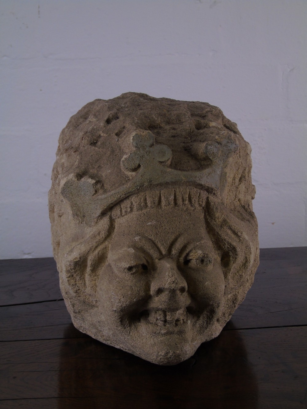An early Grotesque stone head of a king possibly 17th Century  View II