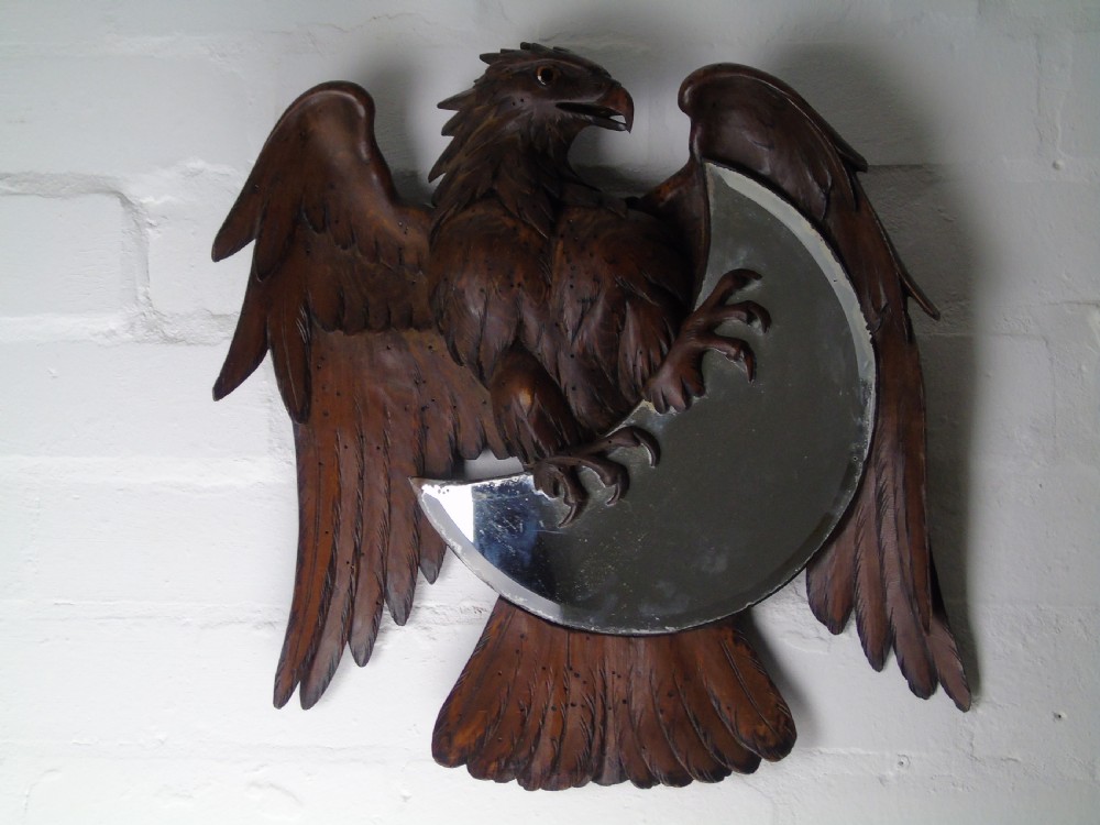 A fine 19th Century carved walnut mirror