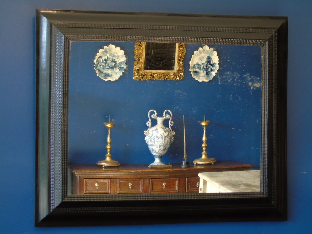 A fine late 17th-early 18th Century ripple molded mirror View II