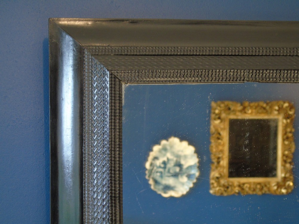 A fine late 17th-early 18th Century ripple molded mirror View III