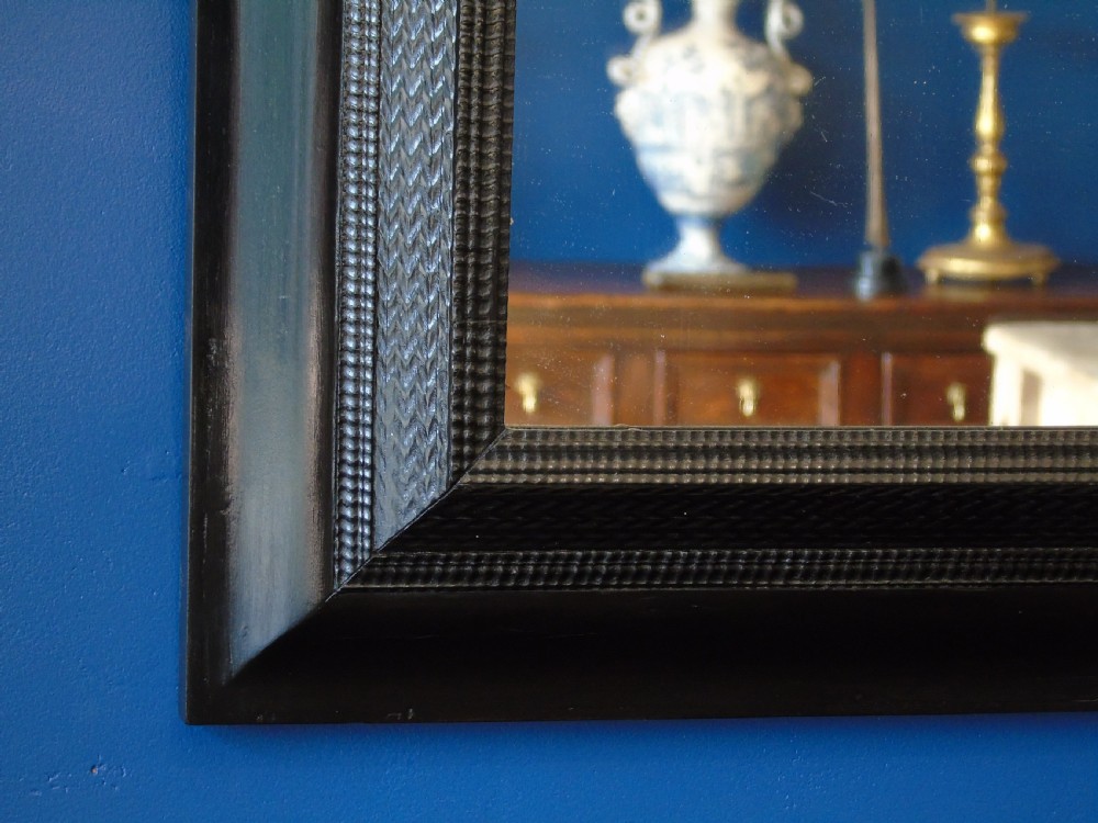 A fine late 17th-early 18th Century ripple molded mirror View IV