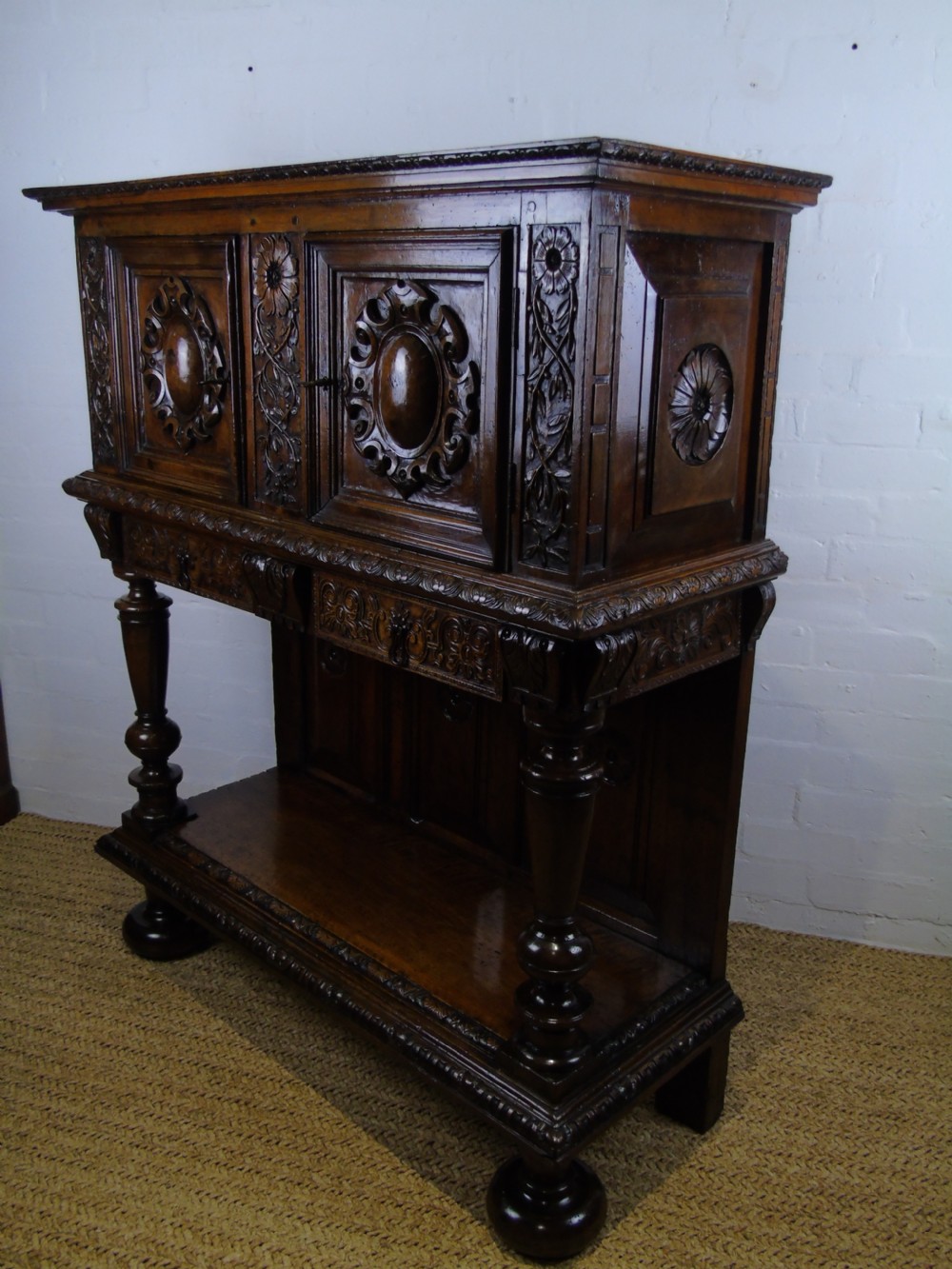A 17th century French walnut livery cupboard View IX