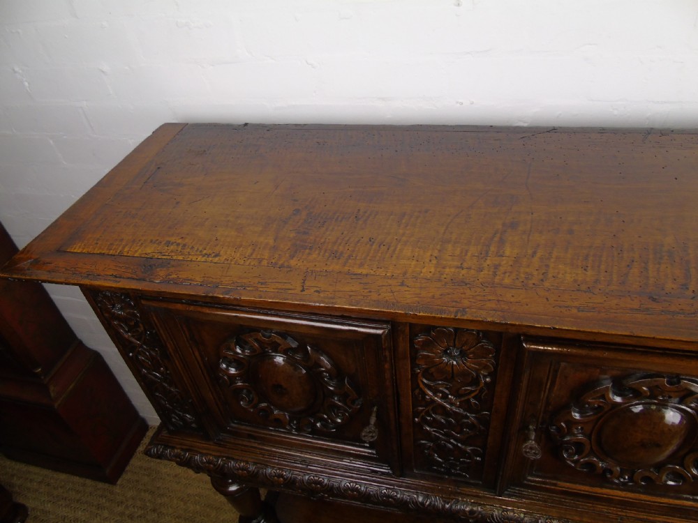 A 17th century French walnut livery cupboard View XII