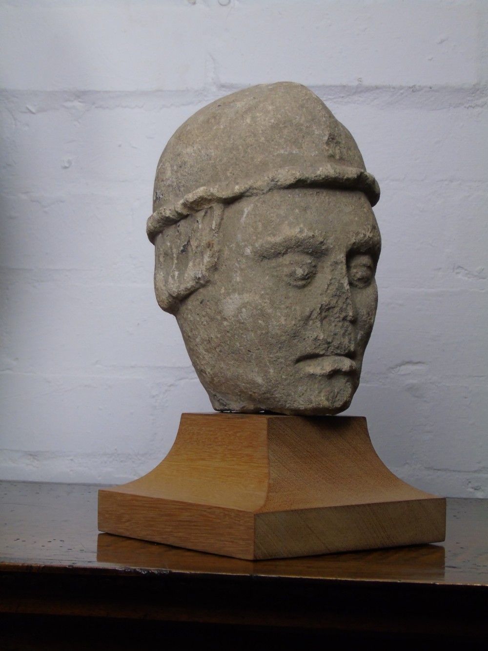 A 13th-14th Century Norman limestone head View III