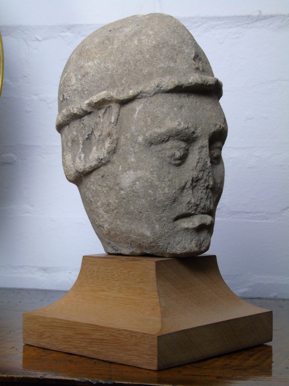 A 13th-14th Century Norman limestone head View IV
