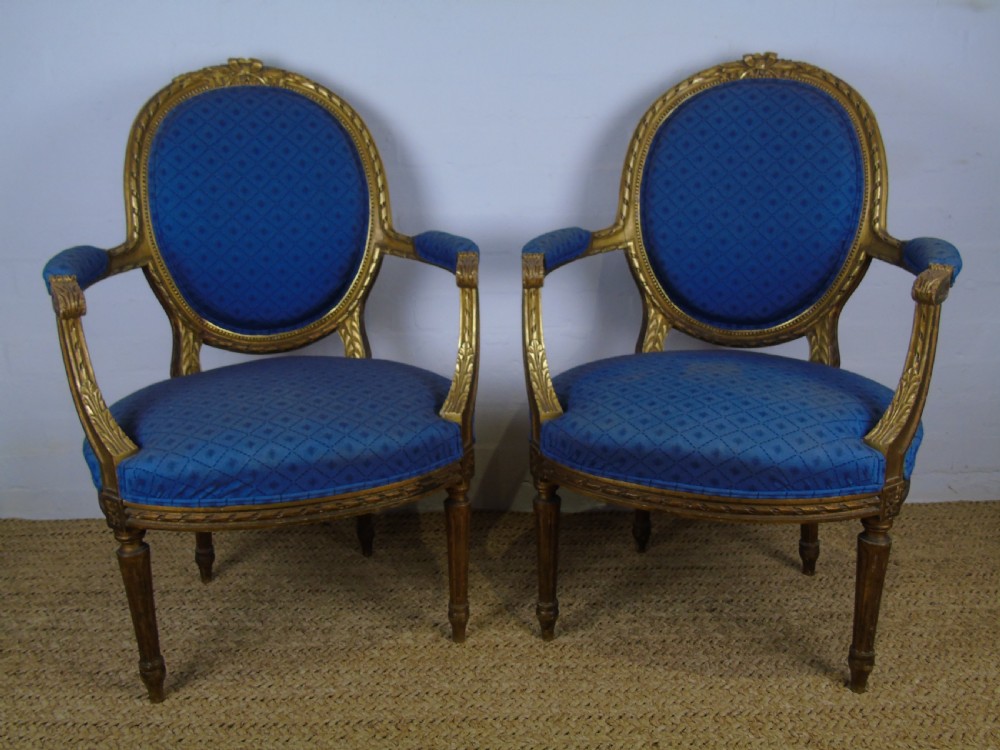 A pair of 20th Century French occasional chairs