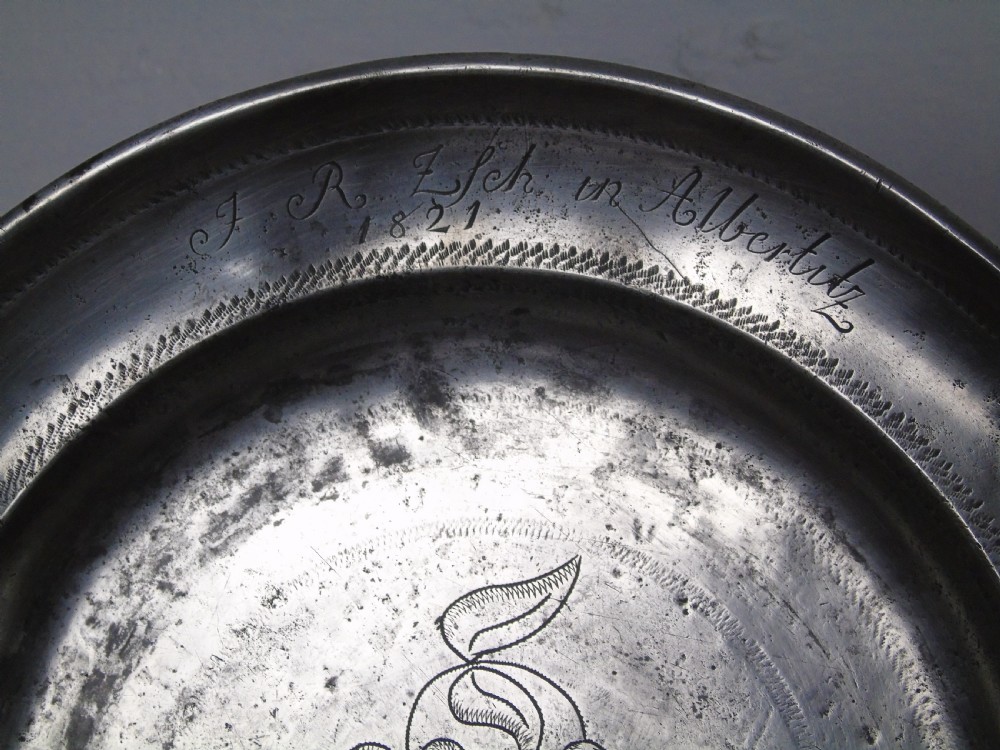 Early 18th Century wriggle-work pewter charger View III