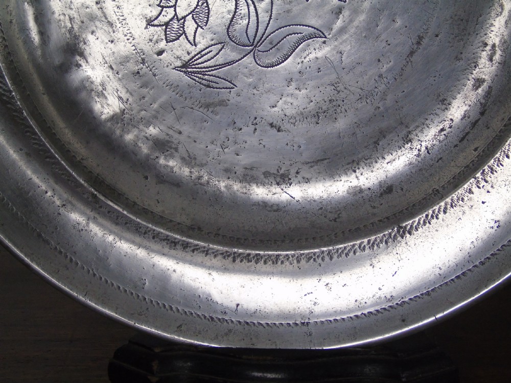 Early 18th Century wriggle-work pewter charger View IV