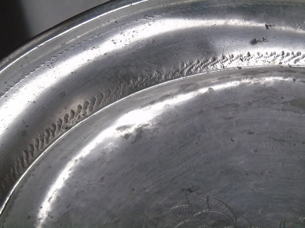 Early 18th Century wriggle-work pewter charger View V
