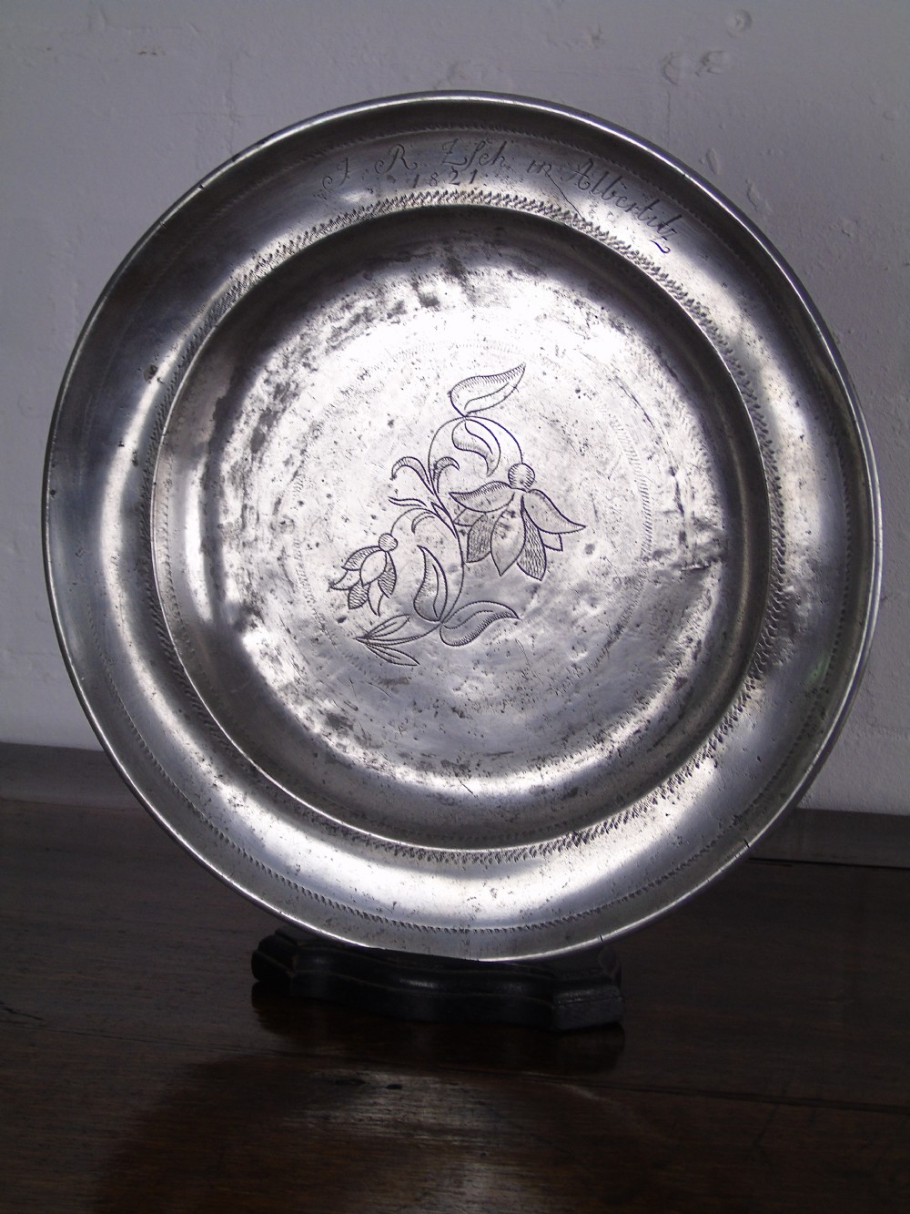 Early 18th Century wriggle-work pewter charger