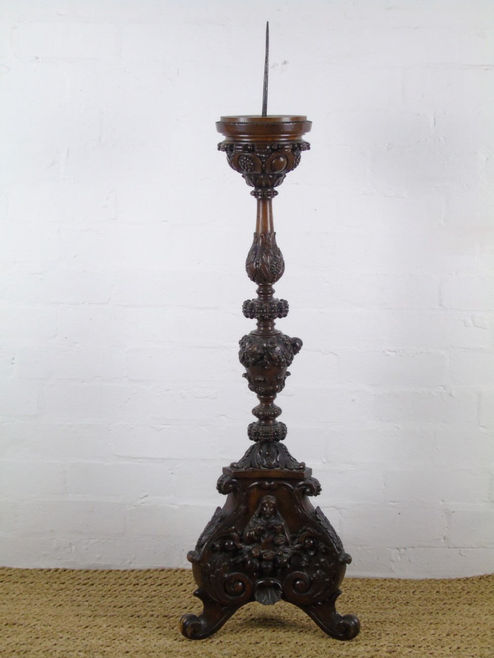 A large heavily carved 19th Century Pricket 