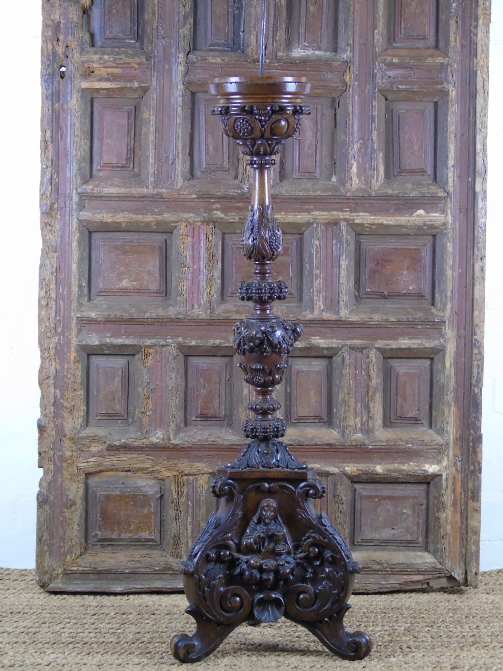 A large heavily carved 19th Century Pricket  View II