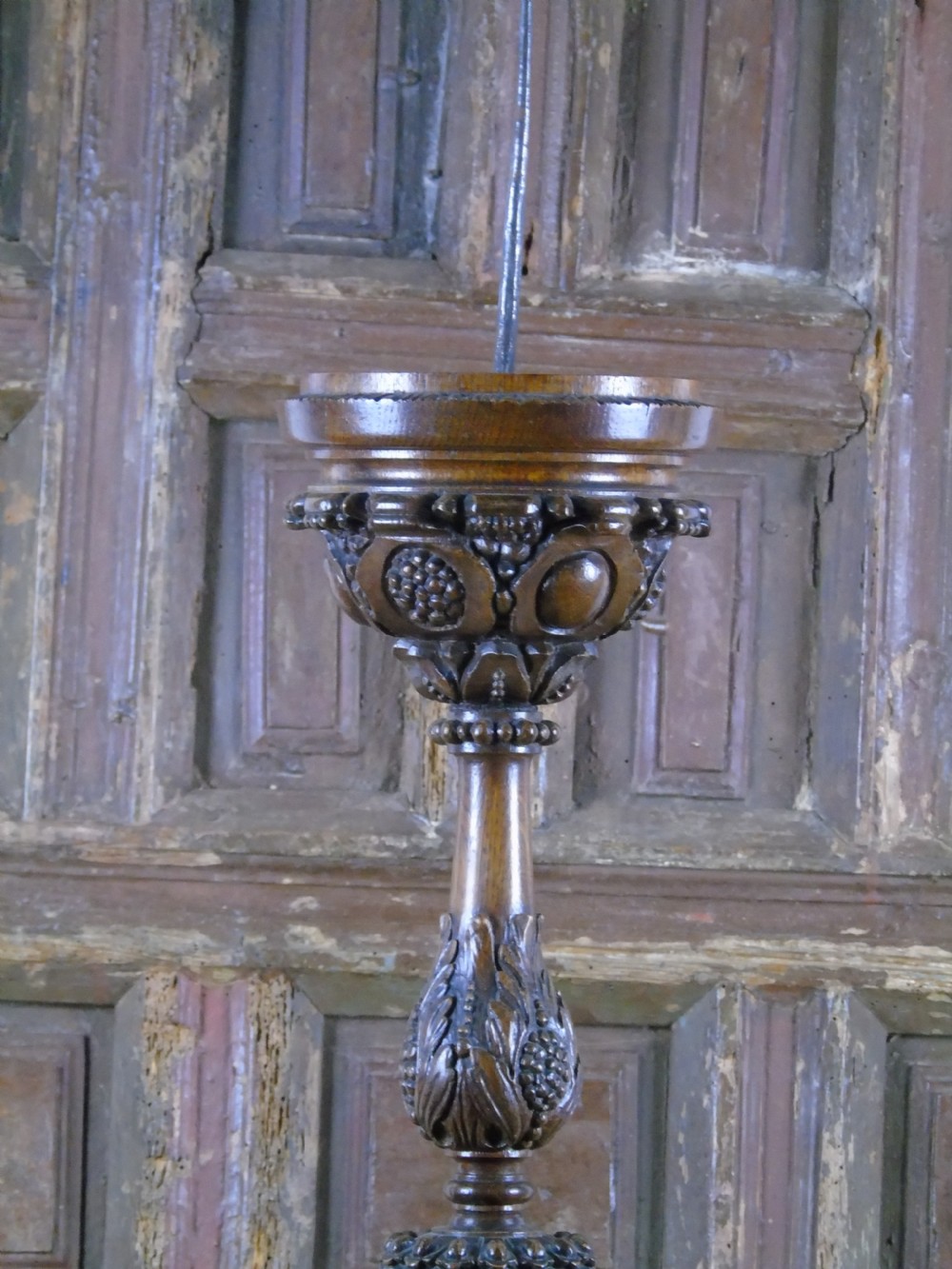 A large heavily carved 19th Century Pricket  View III