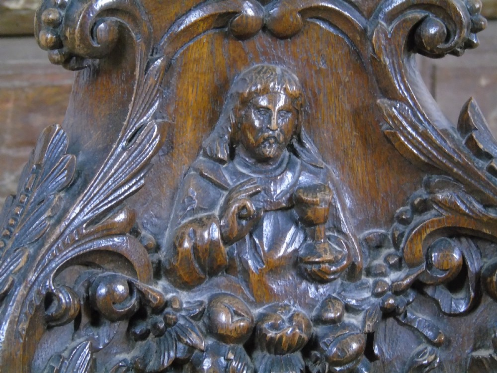 A large heavily carved 19th Century Pricket  View VI