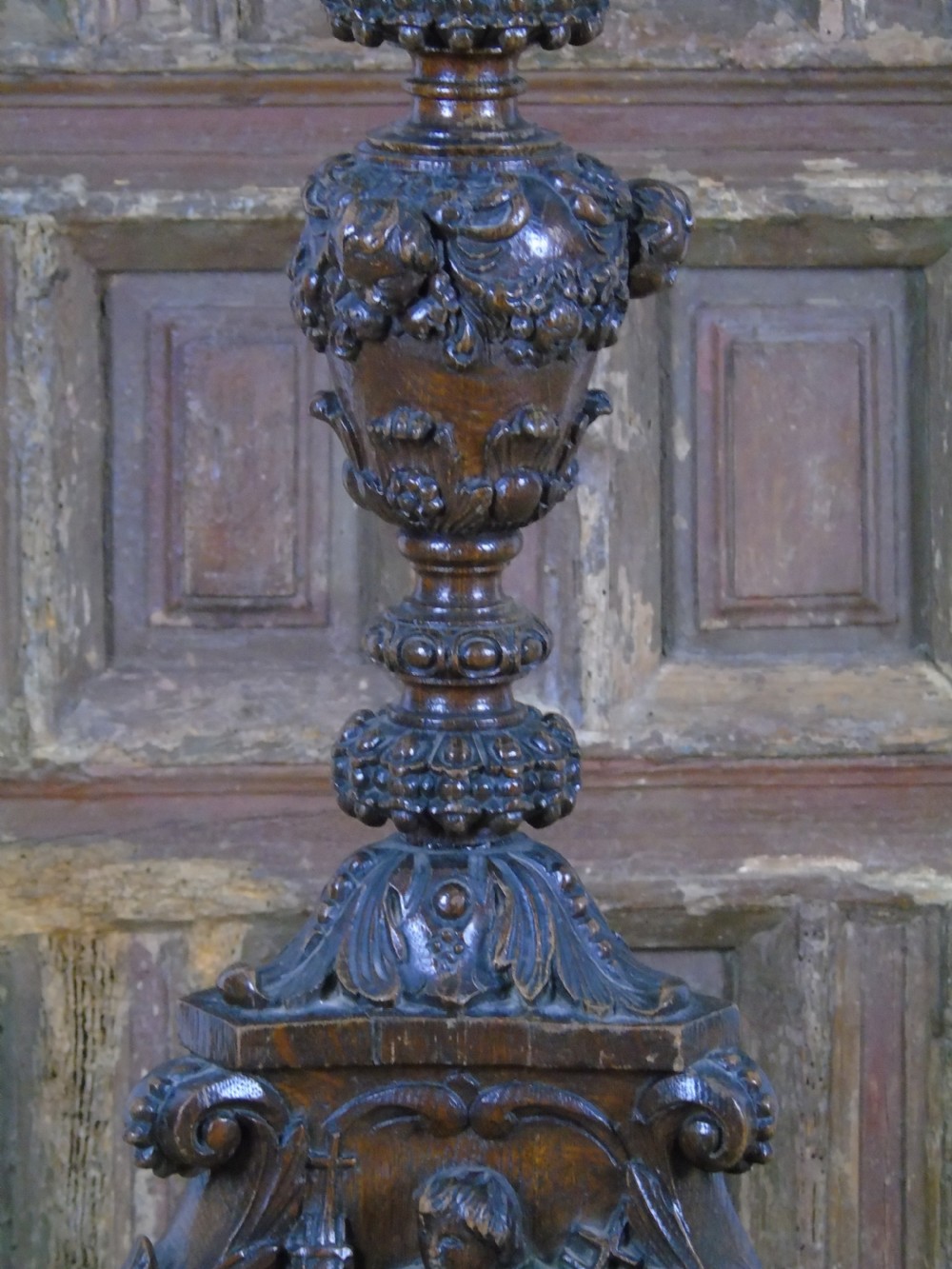 A large heavily carved 19th Century Pricket  View X