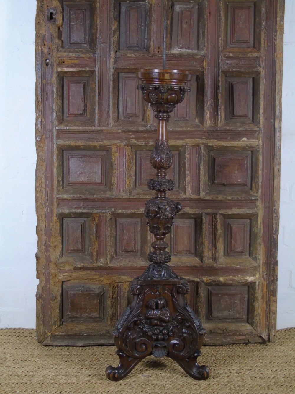A large heavily carved 19th Century Pricket  View XII