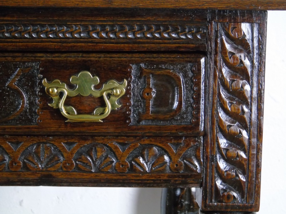 A fabulous 17th century oak side table View IX