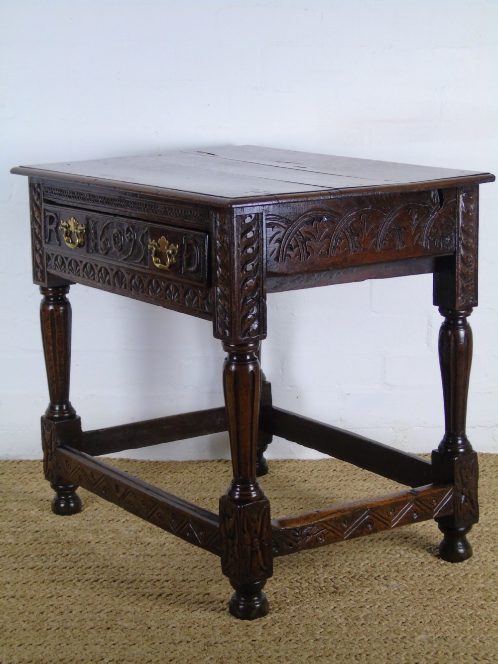 A fabulous 17th century oak side table View X
