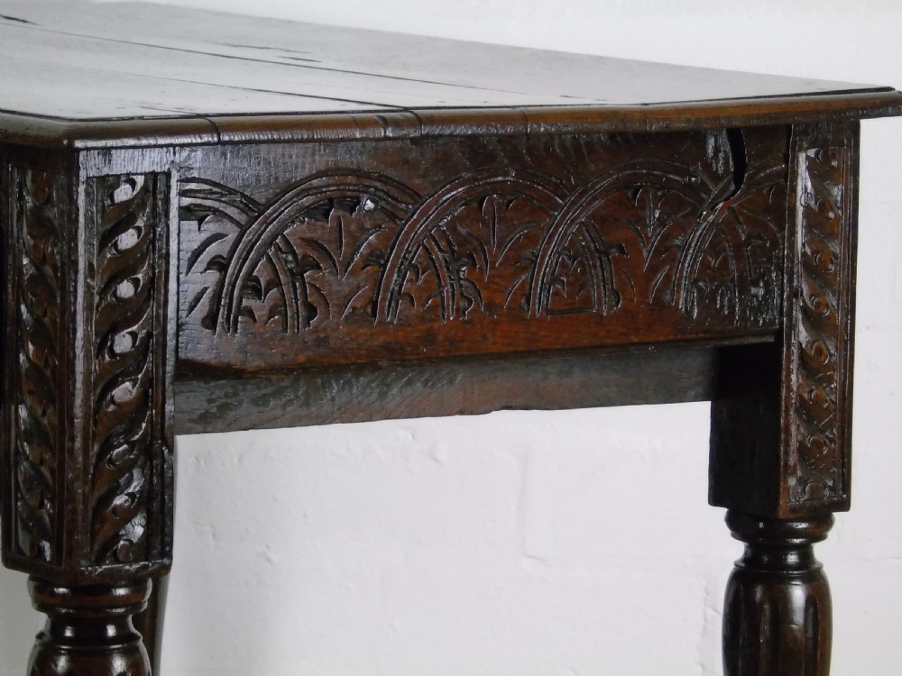 A fabulous 17th century oak side table View XII
